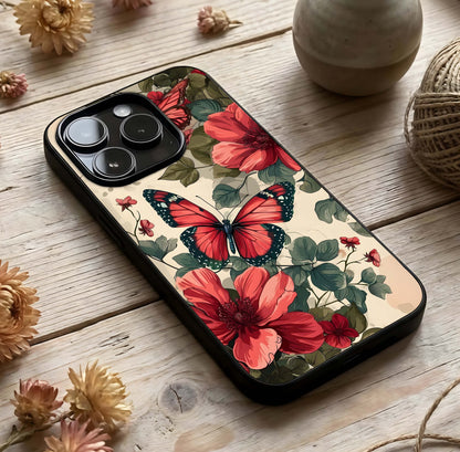 Crimson Butterfly Garden Glass Case photographed in natural light showing reflective finish and floral depth.