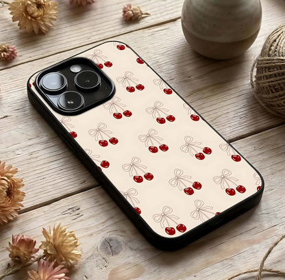 Cute Cherry Pattern Glass Case photographed in natural light showing reflective finish and playful depth.