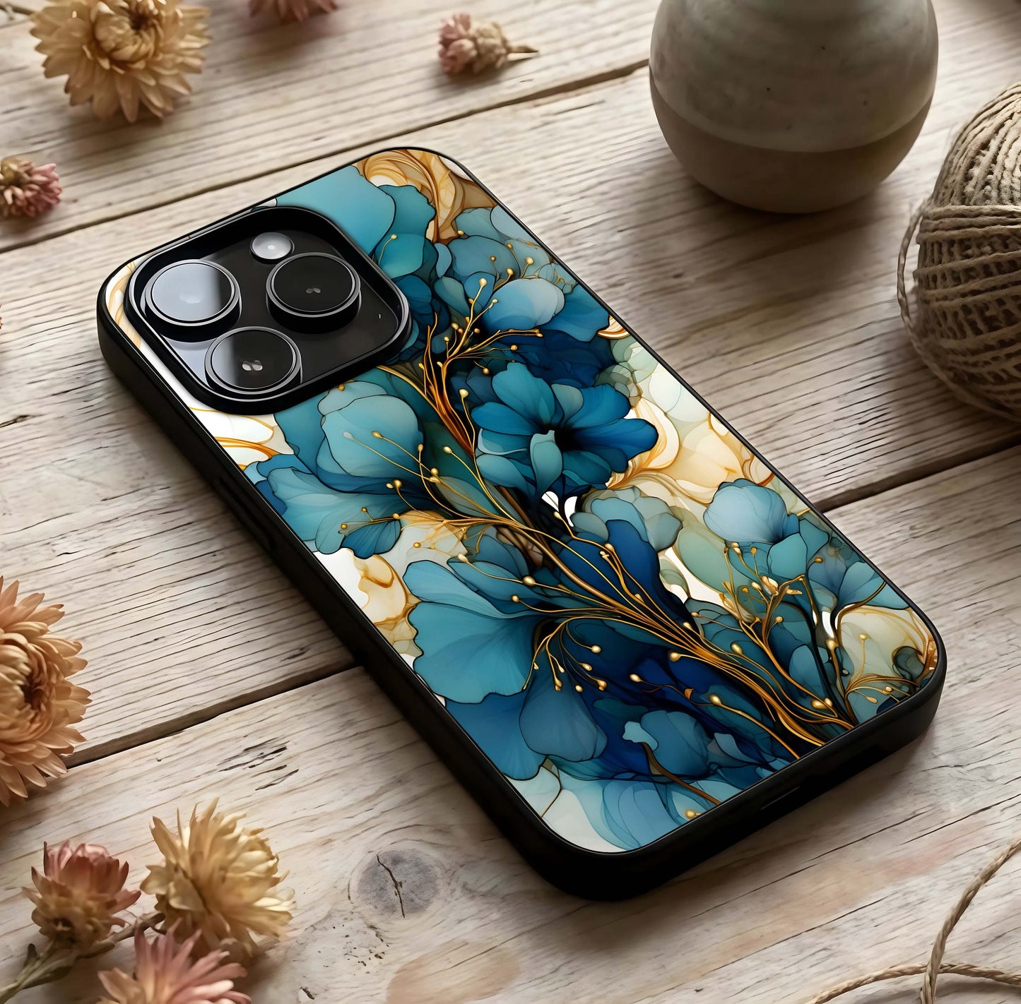 Golden Bloom Symphony Glass Case photographed in natural light showing reflective finish and graceful depth.