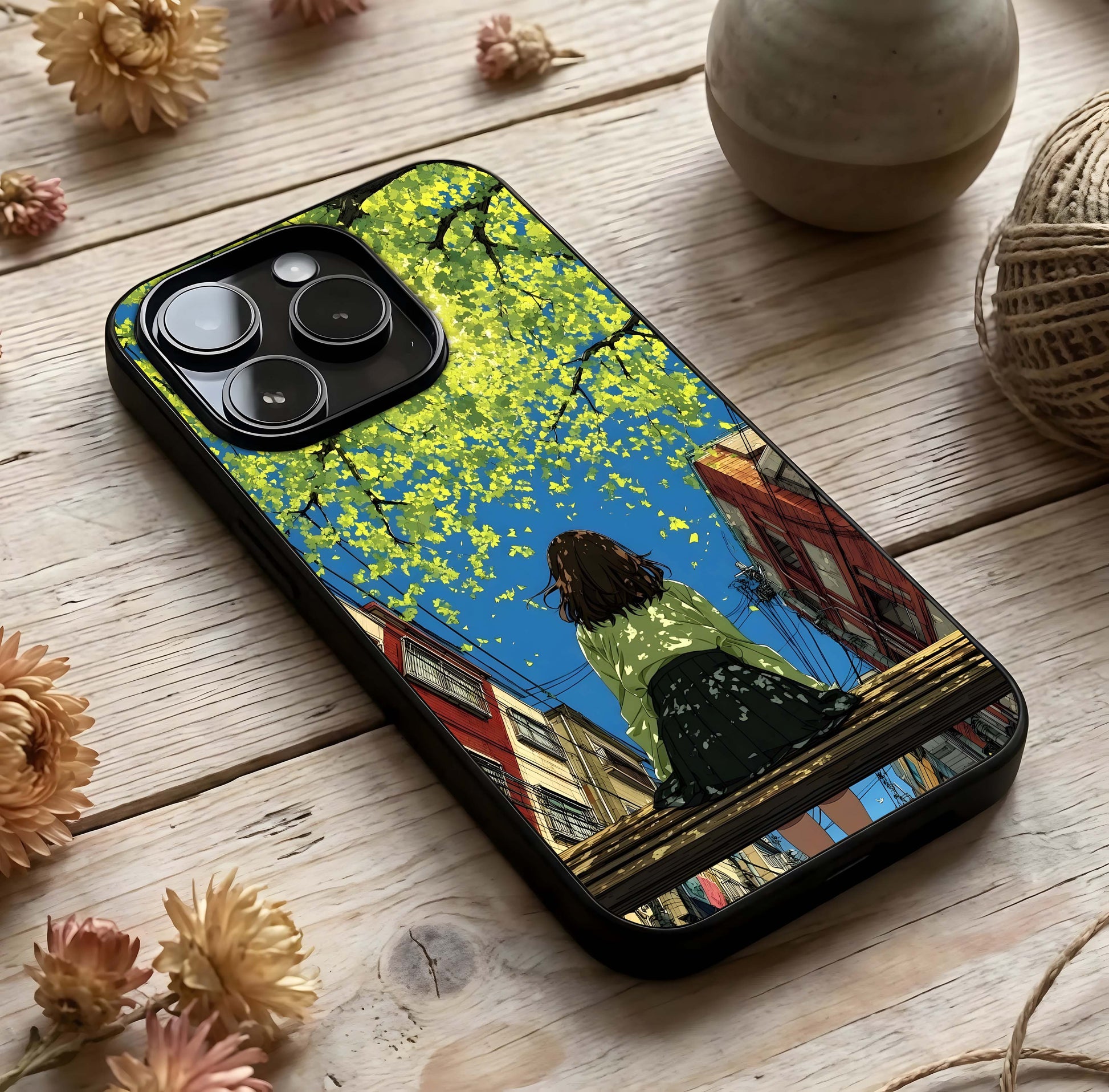 Golden Leaves Glow Glass Case photographed in natural light showing reflective finish and organic depth.