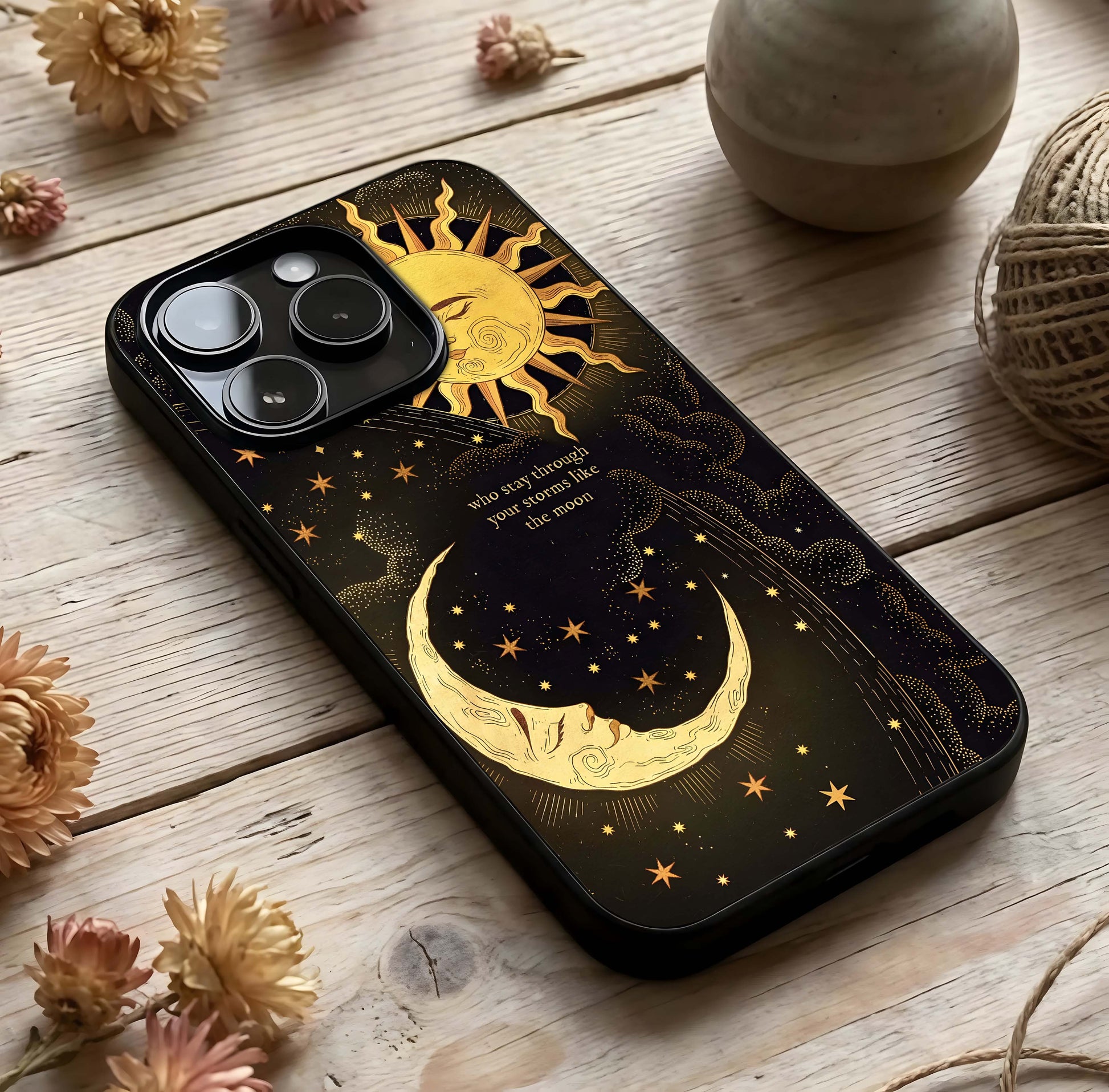 Golden Lunar Love Glass Case photographed in natural light showing reflective finish and tender depth.
