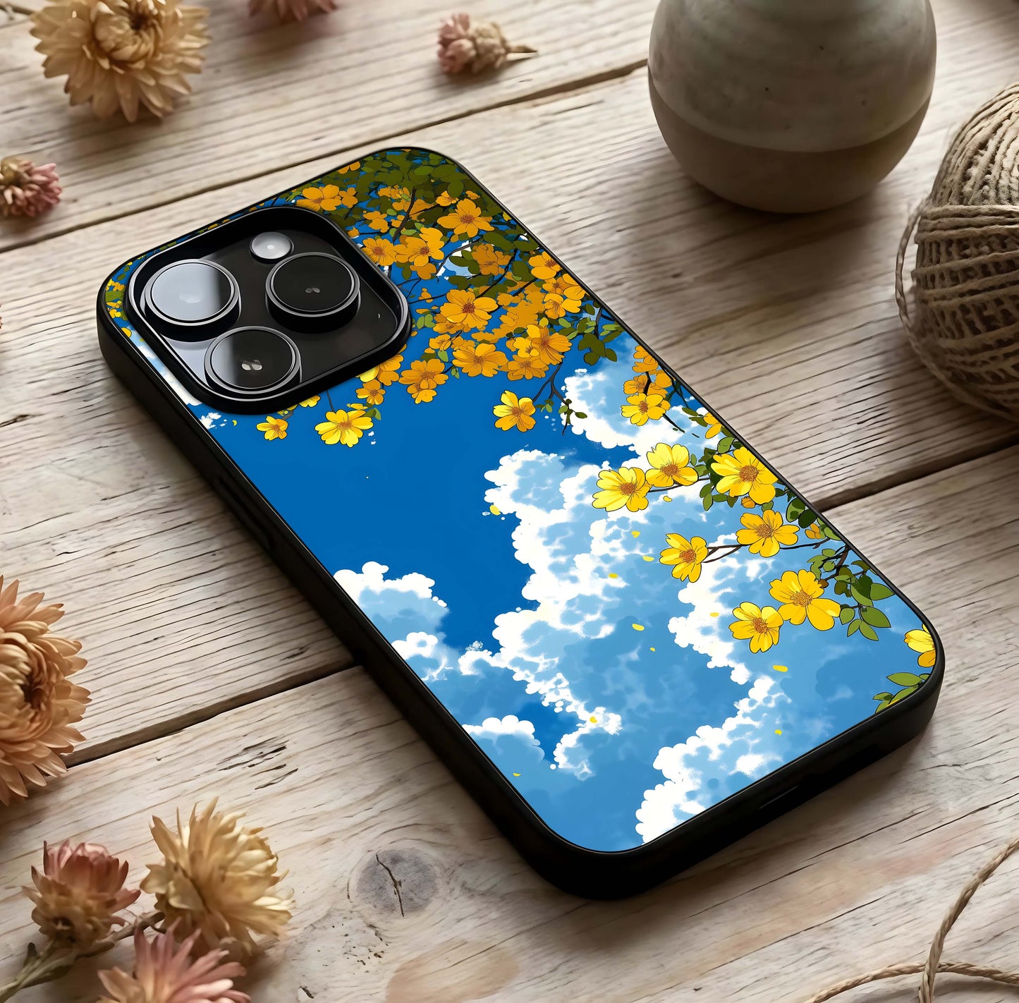 Golden Petal Sky Glass Case photographed in natural light showing reflective finish and airy depth.