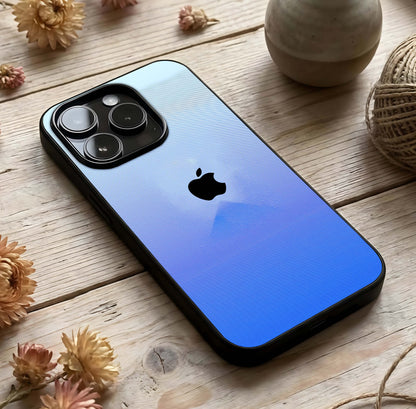 Gradient Apple Vibe Glass Case photographed in natural light showing reflective finish and stylish depth.