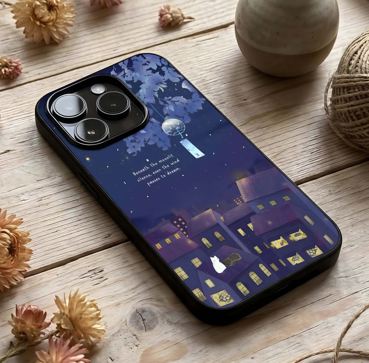 Moonlit Cat Silence Glass Case photographed in natural light showing reflective finish and tranquil depth.