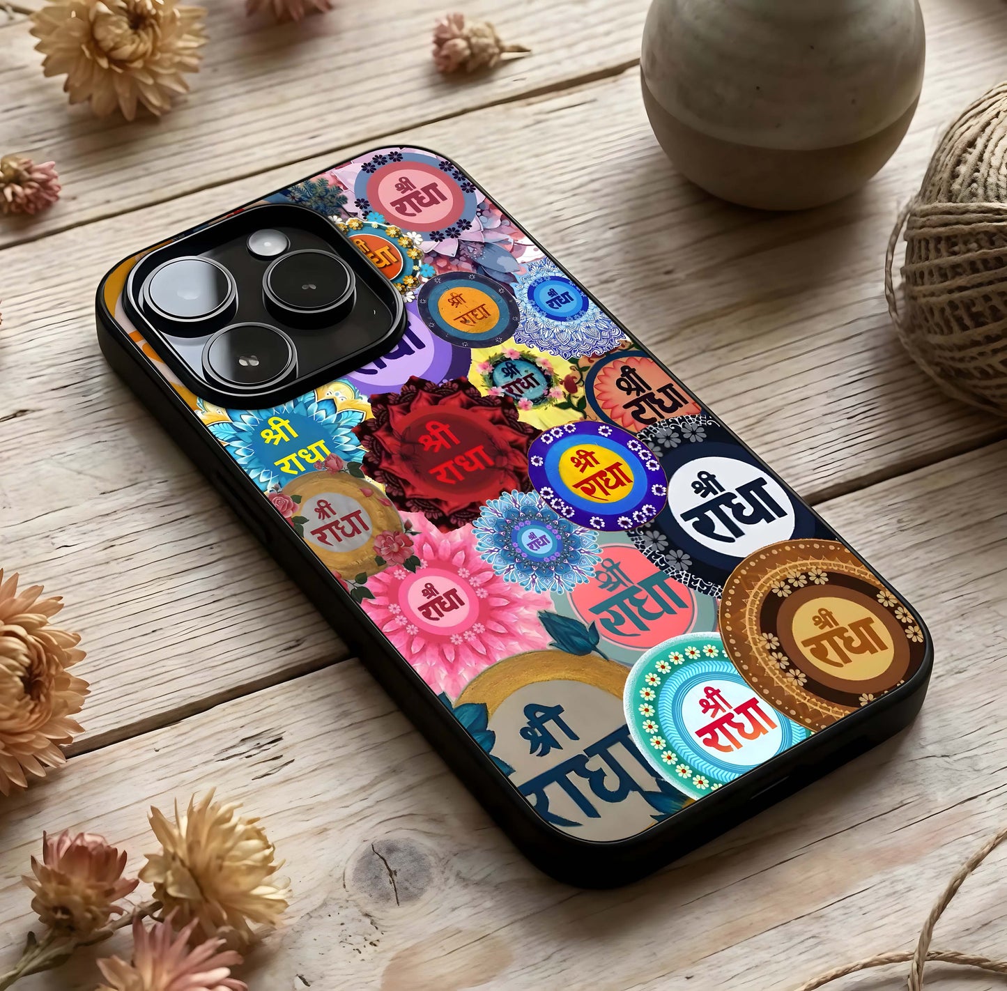 Radha Divine Bloom Glass Case photographed in natural light showing reflective finish and divine depth.