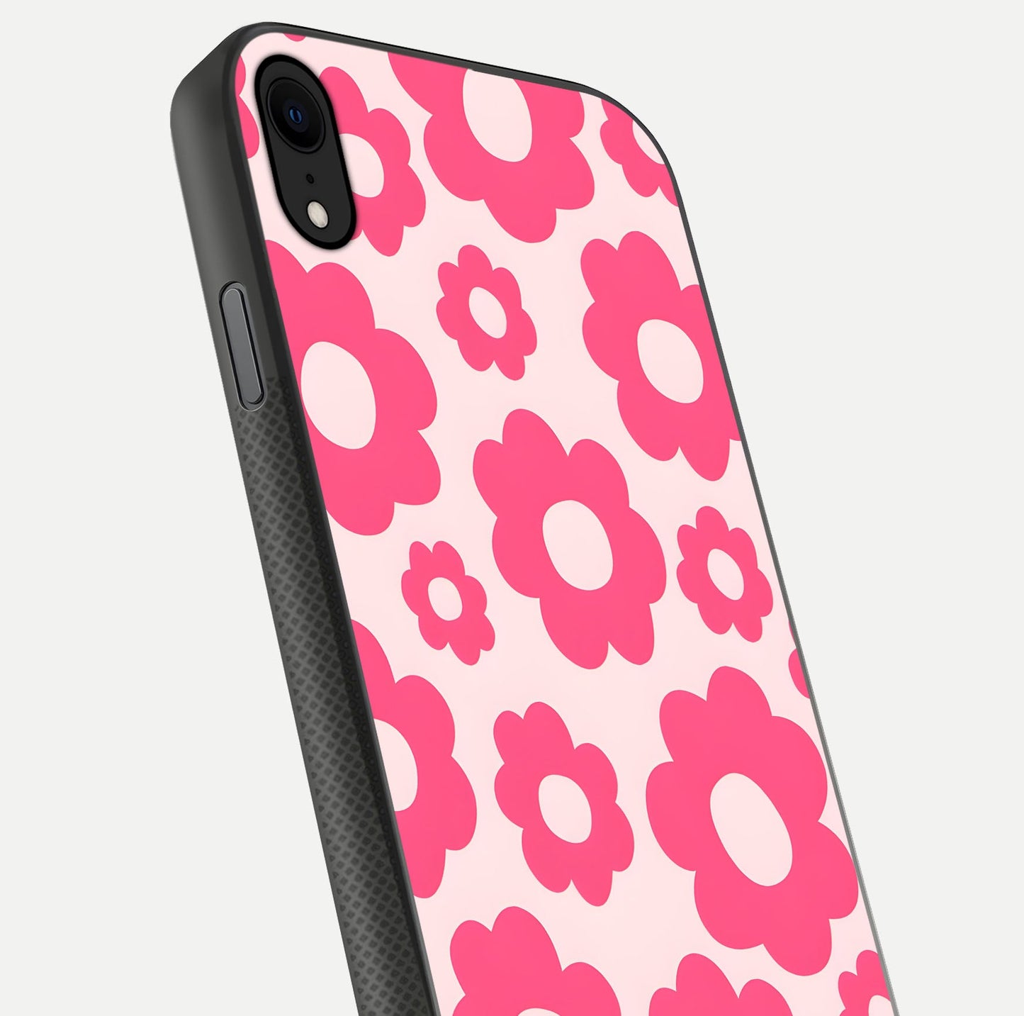 Blush Flower Pop iPhone X glass phone case angled back view highlighting bright floral pop design and side grip texture