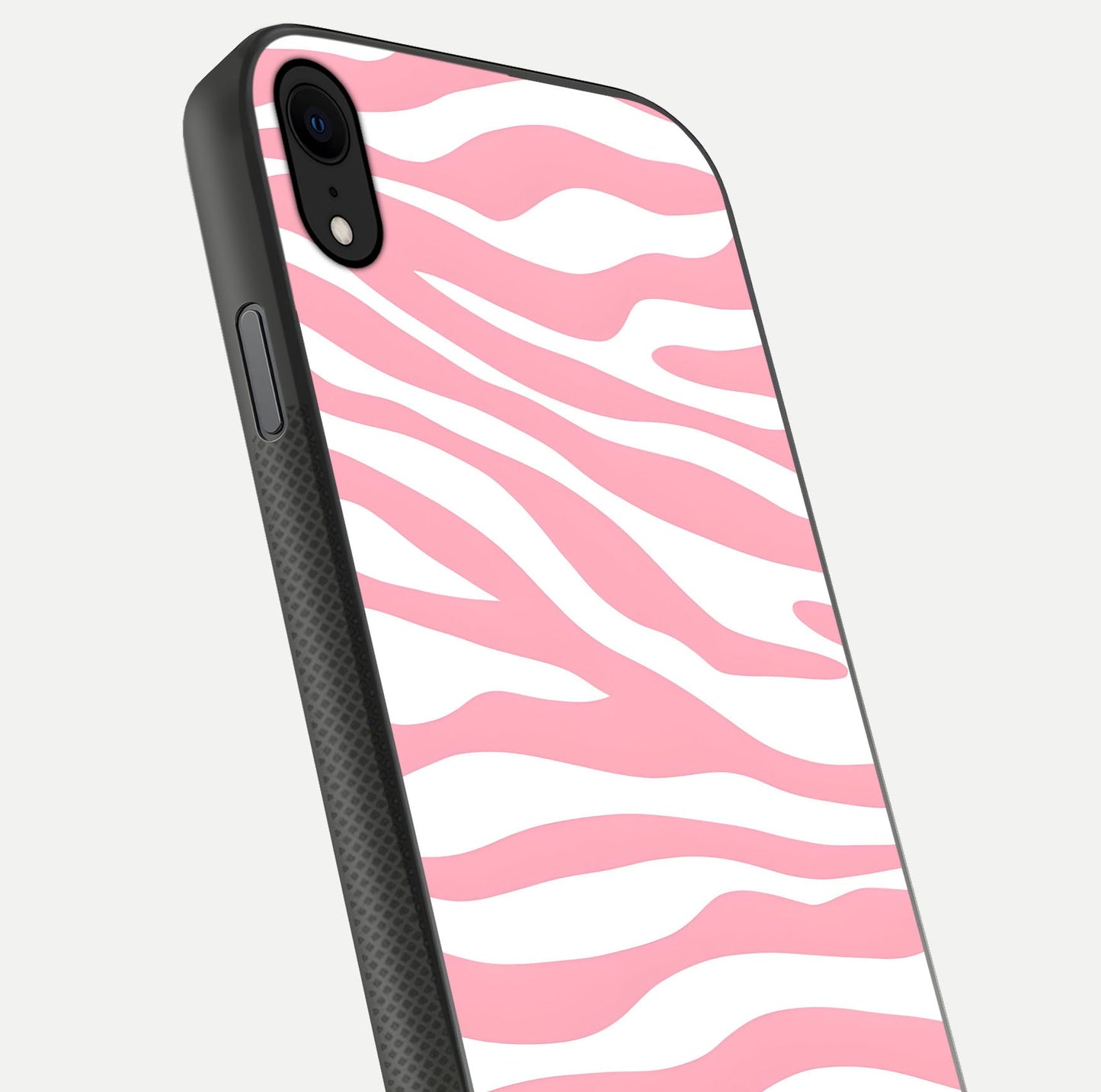 Blush Zebra Flow iPhone X glass phone case angled back view highlighting bold zebra artwork and textured side grip