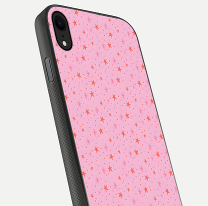 Cosmic Pink Sparkle iPhone X glass phone case angled back view highlighting sparkling galaxy design and textured side grip