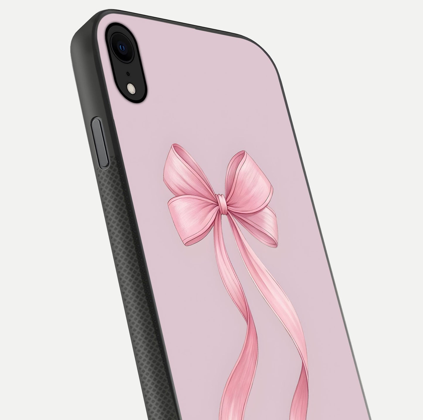 Soft Blush Bow iPhone X glass phone case angled back view highlighting bow artwork and side grip texture