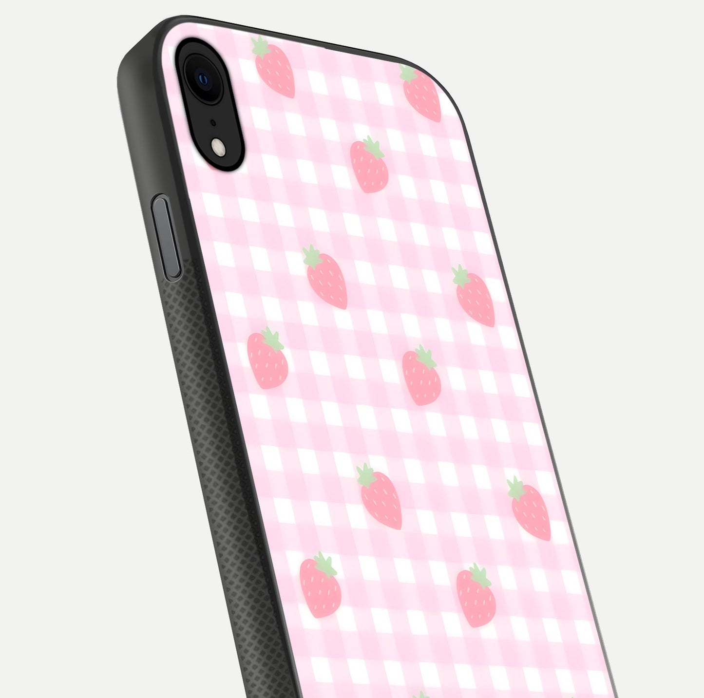 Strawberry Picnic Love iPhone X glass phone case angled back view highlighting strawberry illustrations and textured grip