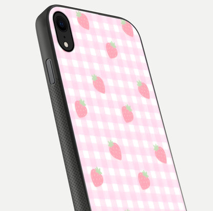 Strawberry Picnic Love iPhone X glass phone case angled back view highlighting strawberry illustrations and textured grip