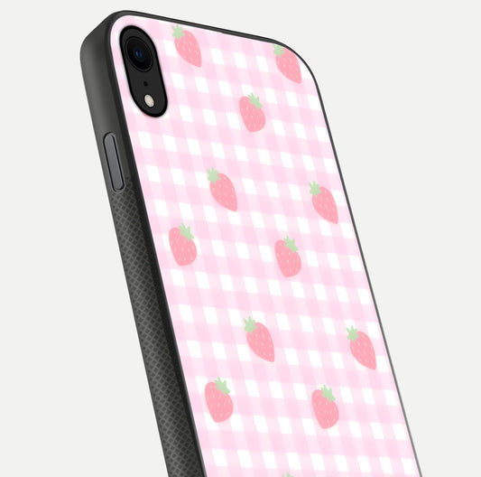 Strawberry Picnic Love iPhone X glass phone case angled back view highlighting strawberry illustrations and textured grip