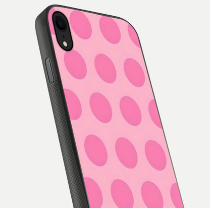 Sweet Dot Dreams iPhone X glass phone case angled back view highlighting dotted artwork and side grip texture