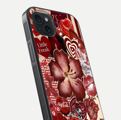 Aesthetic Little Freak Glass Case for iPhone 15 Plus close-up angled shot showing detailed artwork, bold design, and gloss reflection