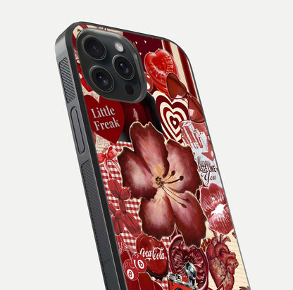 Aesthetic Little Freak Glass Case for iPhone 15 Pro close-up angled shot showing detailed artwork, bold design, and gloss reflection