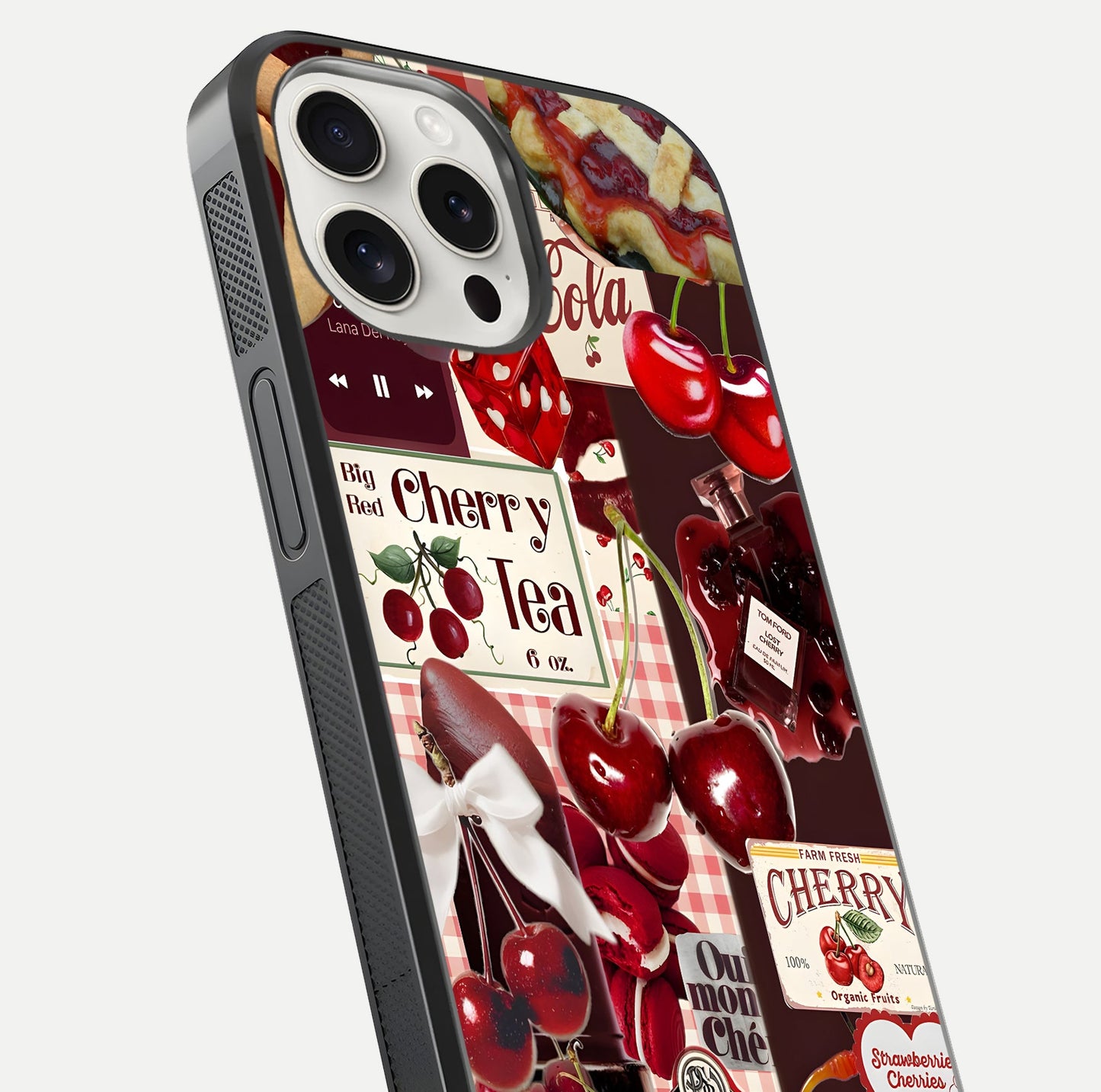 Aesthetic Cherry Tea Glass Case for iPhone 15 Pro Max close-up angled shot showing detailed cherry artwork, red tones, and gloss reflection