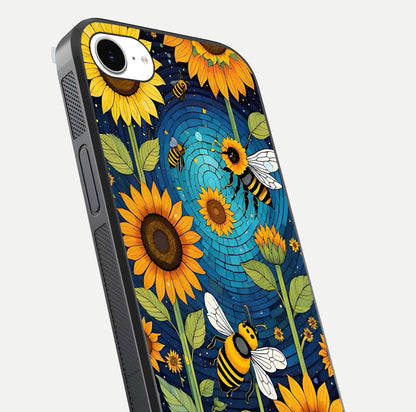 Bees & Sunflowers Glass Case for iPhone 16e close-up angled shot showing detailed petals, bee prints, and glass reflection