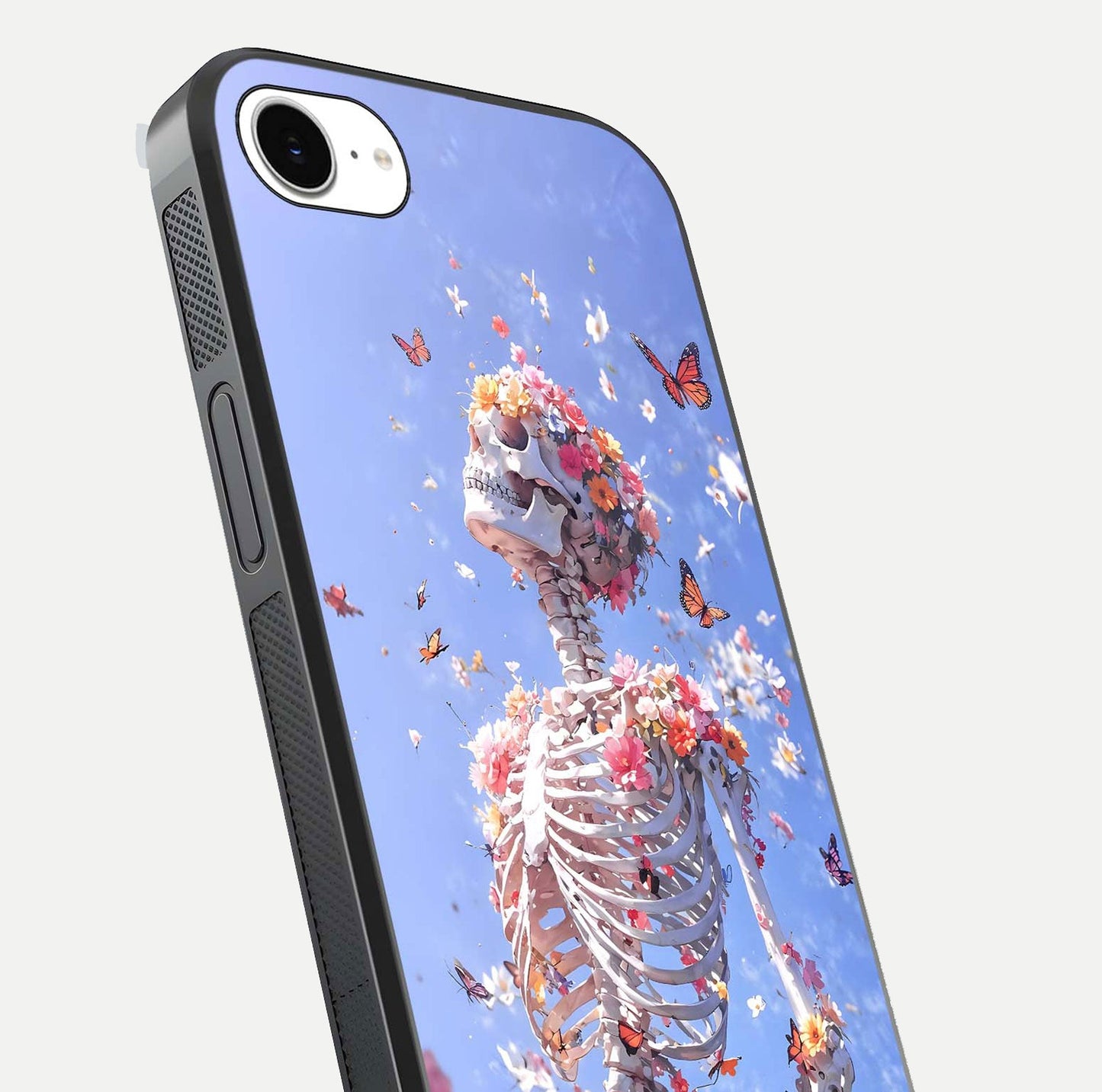 Bloom Beyond Bones Glass Case for iPhone 16e close-up highlighting unique bone-floral fusion art and reflection