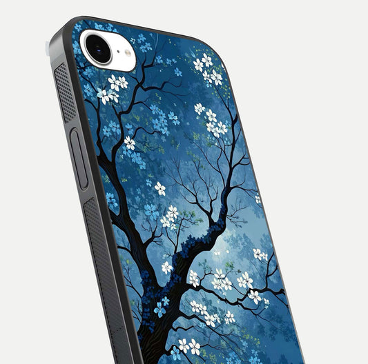 Blue Tree Serenity Glass Case for iPhone 16e close-up view highlighting tree branches and reflection gloss