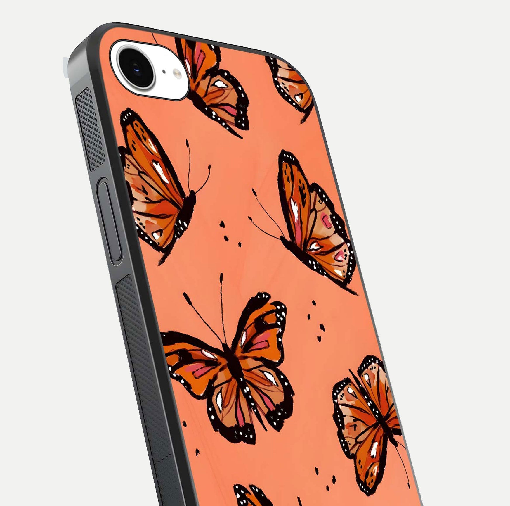 Coral Wing Butterfly Glass Case for iPhone 16e close-up highlighting wing pattern, coral tones, and reflection shine