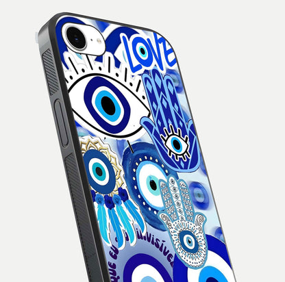 Evil Eyes Dream Glass Case for iPhone 16e close-up highlighting evil-eye charm detail and light reflection on glass