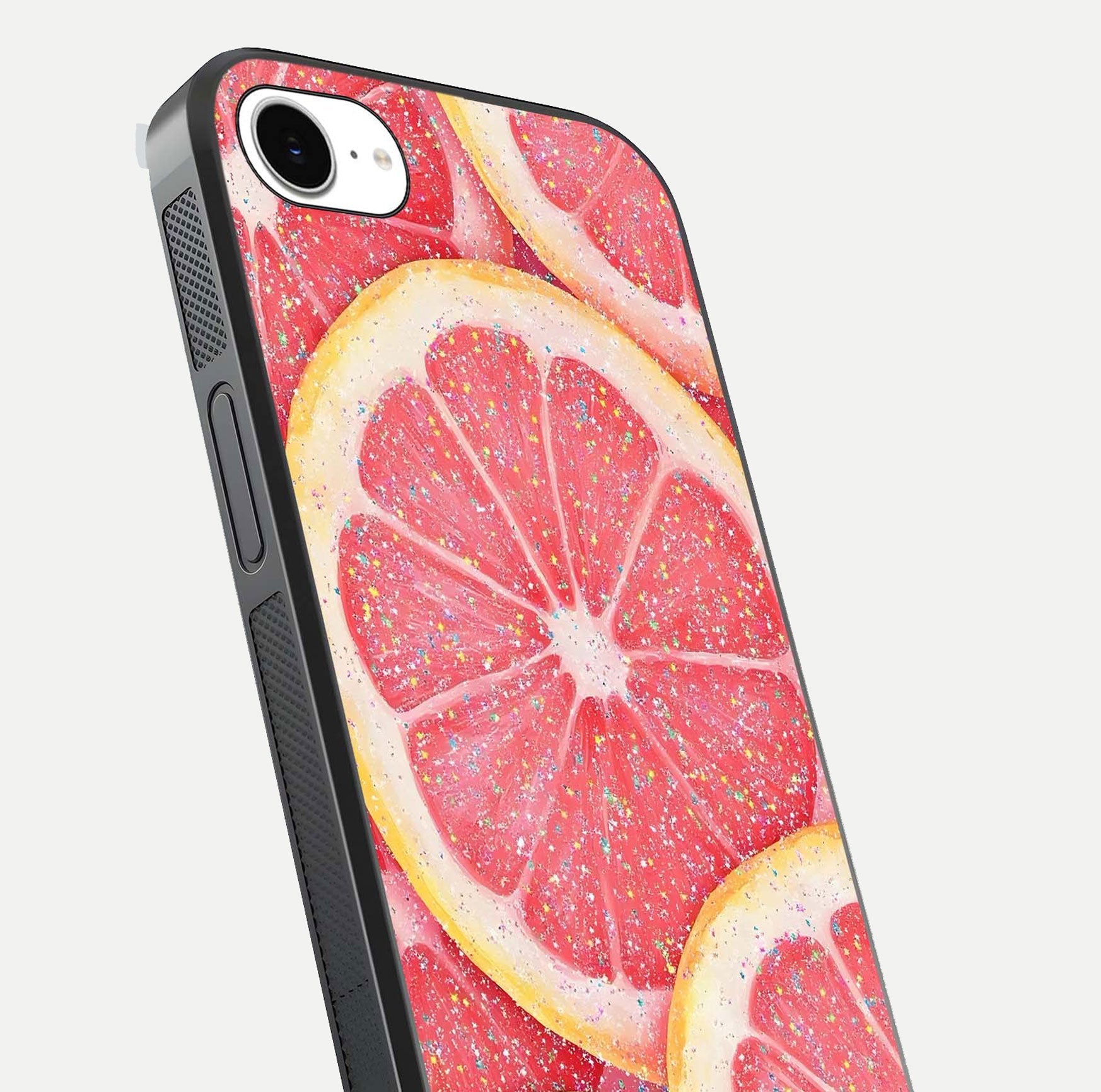 Glitter Grapefruit Glass Case for iPhone 16e close-up angled shot showing fruit texture and glitter reflection