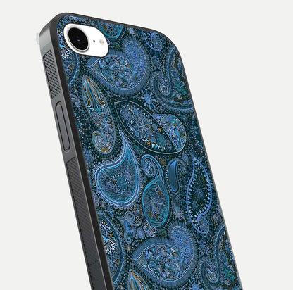 Midnight Paisley Glow Glass Case for iPhone 16e close-up angled shot showing floral details and gloss texture