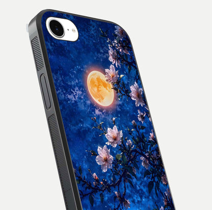 Moonlit Blossoms Night Glass Case for iPhone 16e close-up angled shot showing petal glow and reflection detail