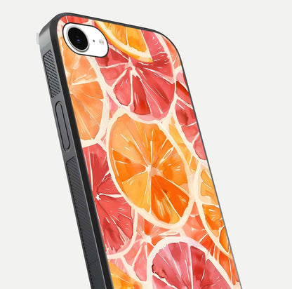 Orange Fruits Pattern Glass Case for iPhone 16e close-up angled shot showing juicy fruit texture and reflection