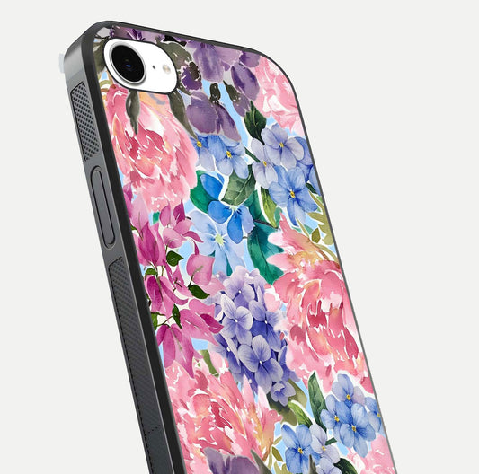 Pastel Floral Mix Glass Case for iPhone 16e close-up angled shot highlighting flower detail and reflection