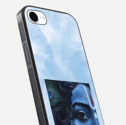 Spiritual Krishna Glass Case for iPhone 16e close-up angled shot showing HD print, color tone, and reflection