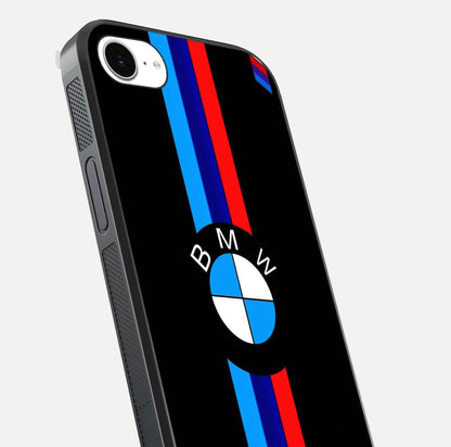 Turbo BMW Beast Glass Case for iPhone 16e close-up angled shot highlighting car detailing and reflection
