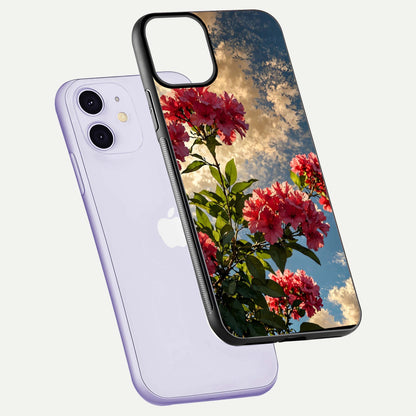 Red Bloom Skies Glass Case for iPhone 11 floating dual-view mockup showing glass gloss and floral pattern