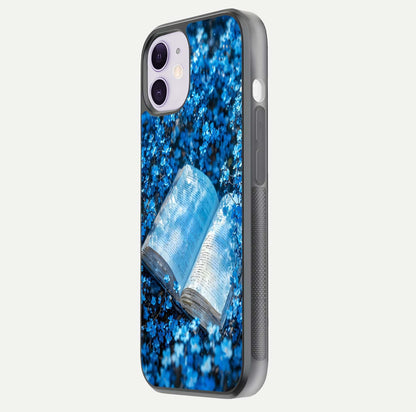 Blue Bloom Tales Glass Case for iPhone 11 side-angle image showing blue floral pattern and glossy finish