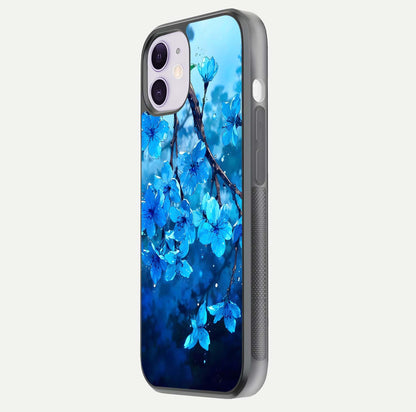 Blue Blossoms Branch Glass Case for iPhone 11 side-angle image showing blossom pattern flow and glossy texture