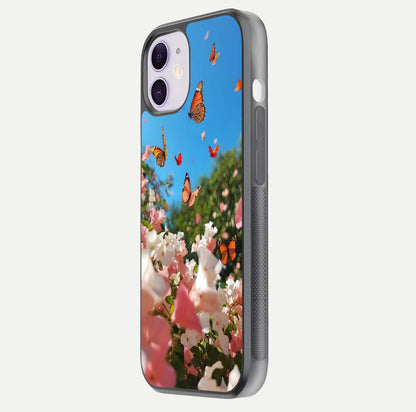 Butterflies in Bloom Sky Glass Case for iPhone 11 side-angle image showing delicate details and gloss polish