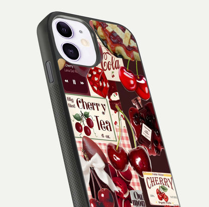 Aesthetic Cherry Tea Glass Case for iPhone 16 Pro close-up angled shot showing detailed cherry artwork, red tones, and gloss reflection
