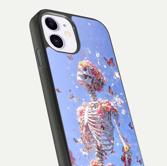Bloom Beyond Bones Glass Case for iPhone 11 close-up highlighting unique bone-floral fusion art and reflection