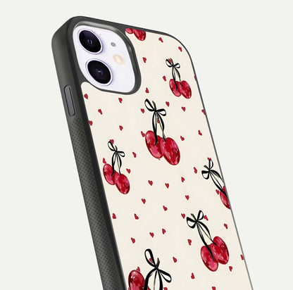 Cherry Heart Bow Glass Case for iPhone 11 close-up highlighting small bows, cherry red tones, and gloss shine