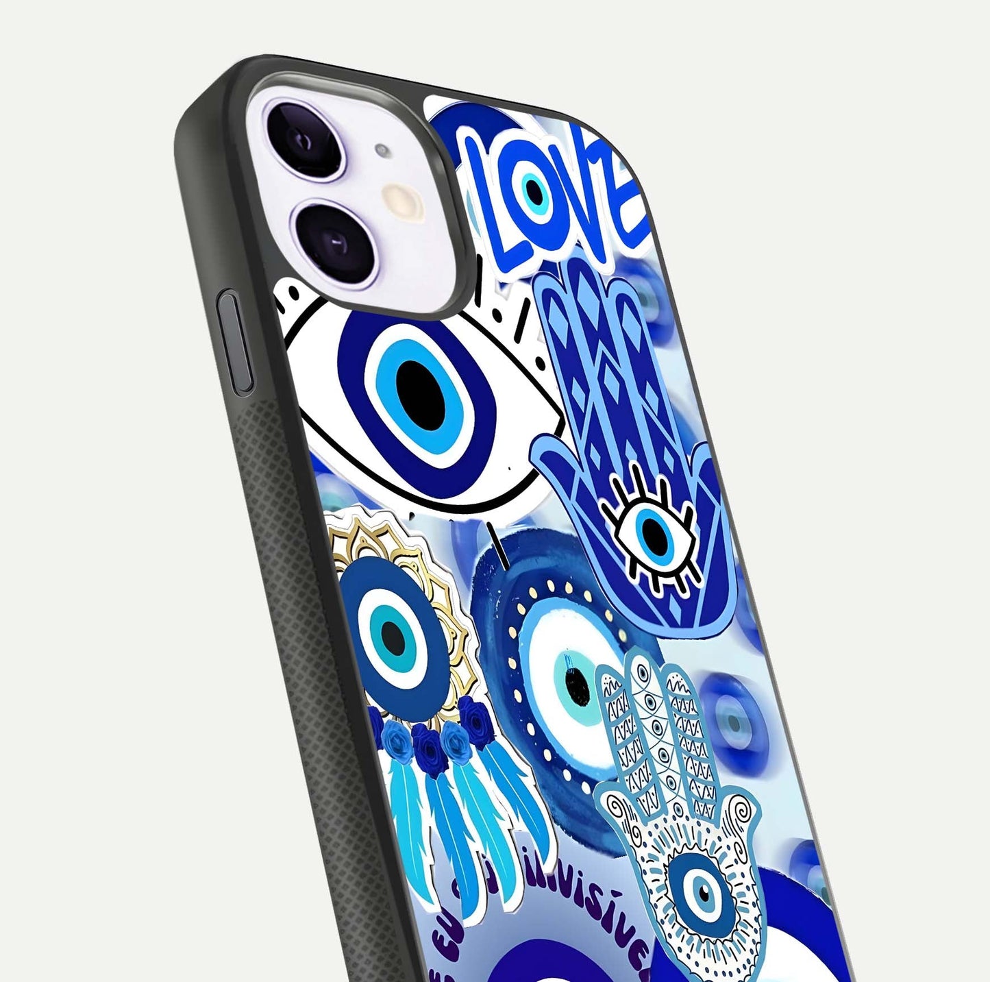 Evil Eyes Dream Glass Case for iPhone 11 close-up highlighting evil-eye charm detail and light reflection on glass