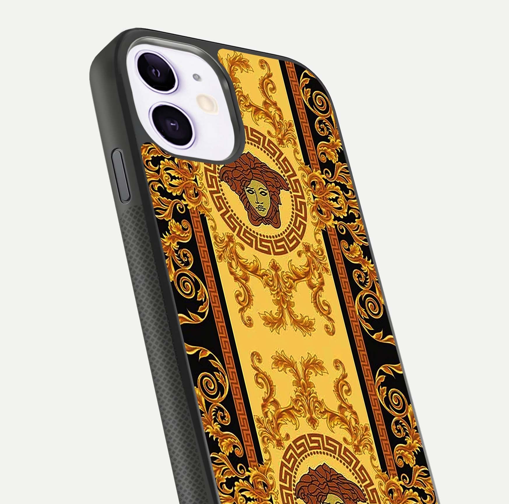 Golden Royal Heritage Glass Case for iPhone 11 close-up angled shot showing intricate design and metallic reflection