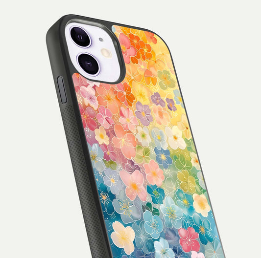 Rainbow Blossom Burst Glass Case for iPhone 11 close-up angled shot showing petal colors and reflection