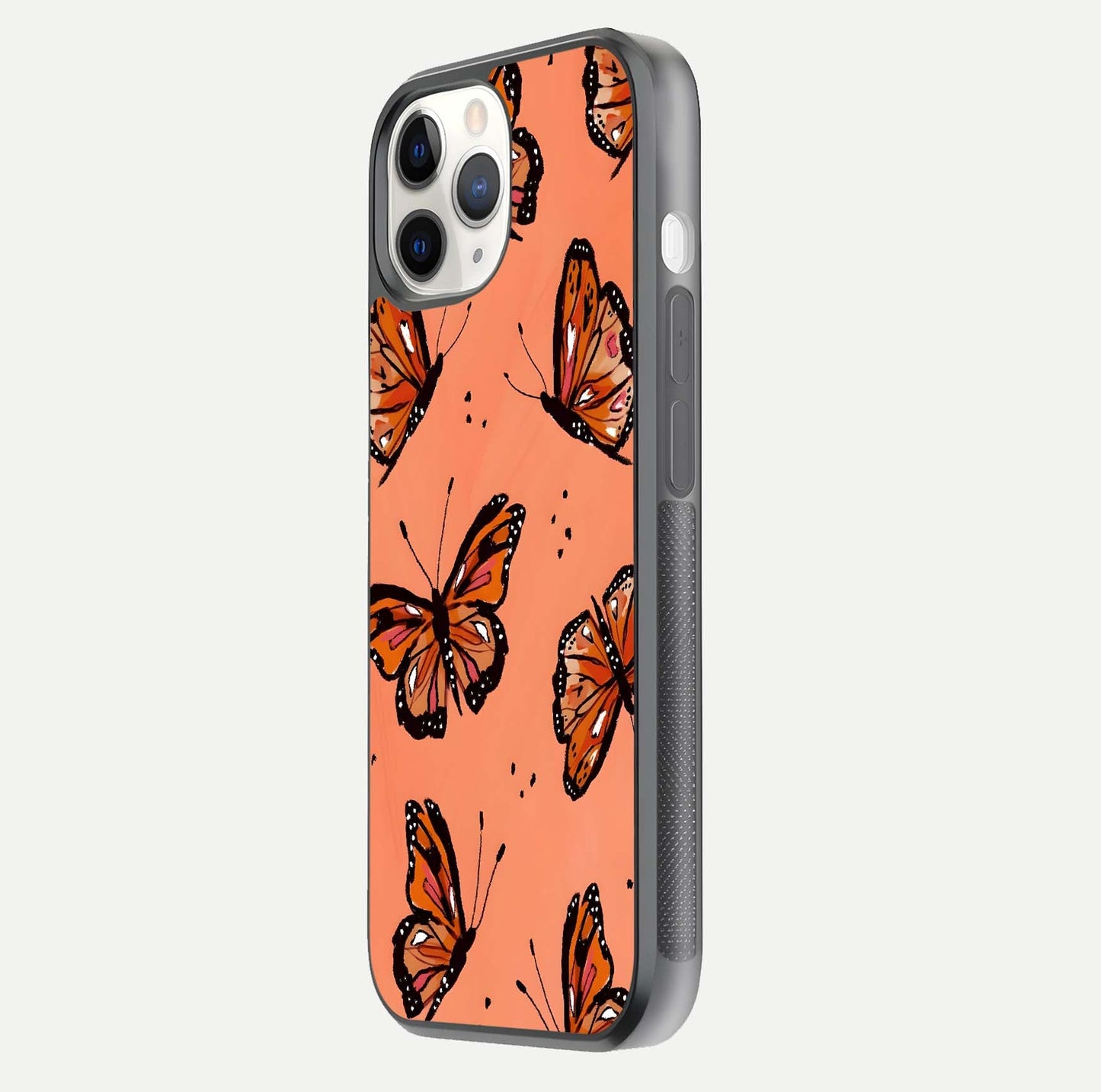 Coral Wing Butterfly Glass Case for iPhone 11 Pro side-angle photo showing reflective finish and smooth edges
