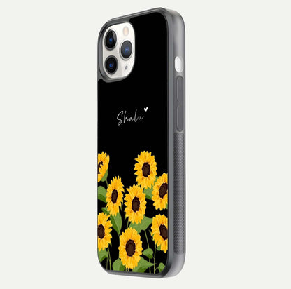 Sunflower Chic Mood Custom Name Glass Case for iPhone 16 Pro side-angle image showing reflection and yellow floral tone