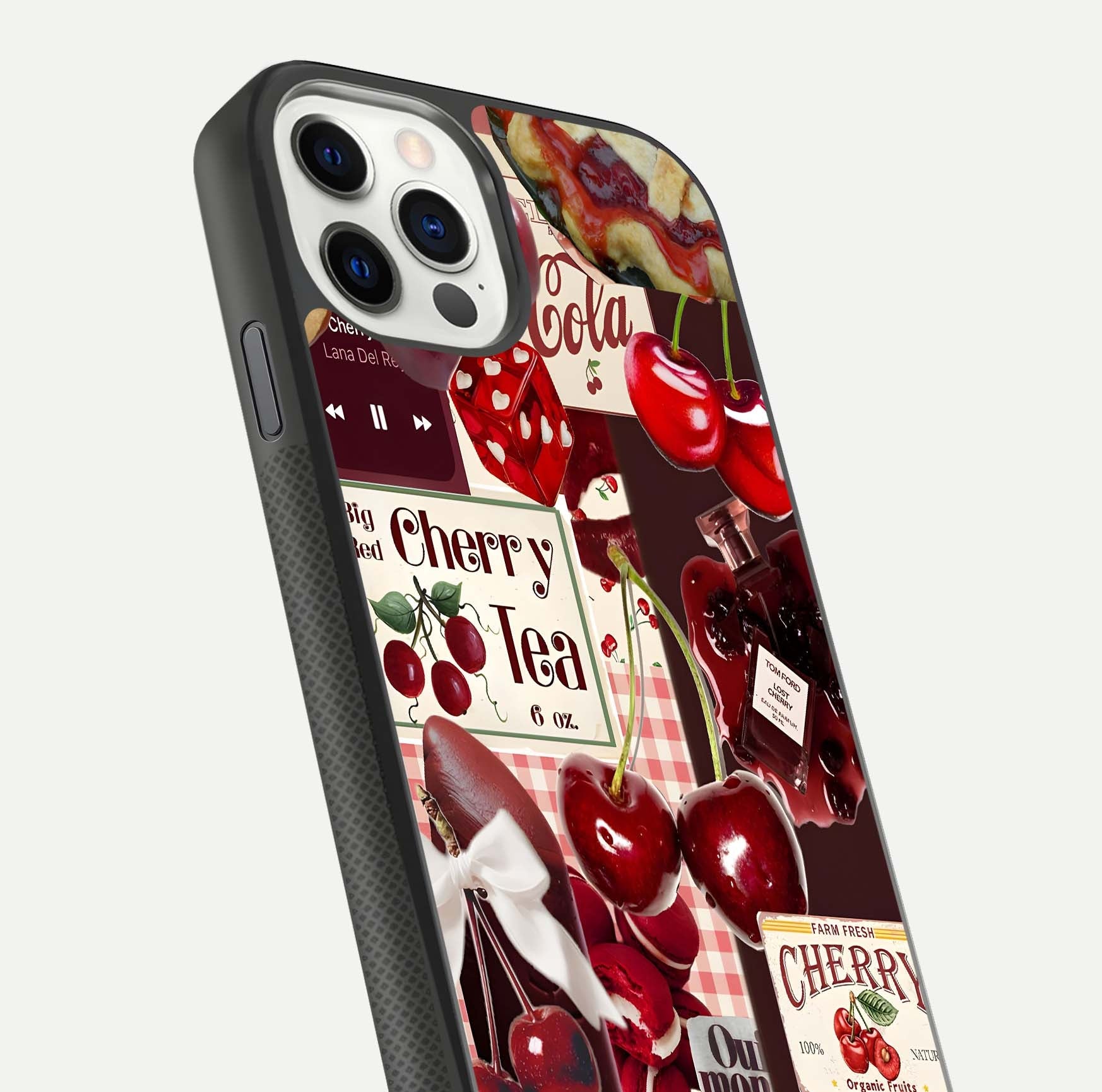 Aesthetic Cherry Tea Glass Case for iPhone 16 Pro close-up angled shot showing detailed cherry artwork, red tones, and gloss reflection