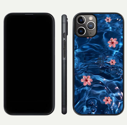 Blooming Water Drift Glass Case for iPhone 11 Pro Max close-up angle showing petal details, soft aqua tones, and smooth gloss reflection