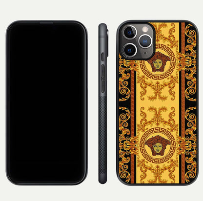 Golden Royal Heritage Glass Case for iPhone 11 Pro Max close-up angled shot showing intricate design and metallic reflection