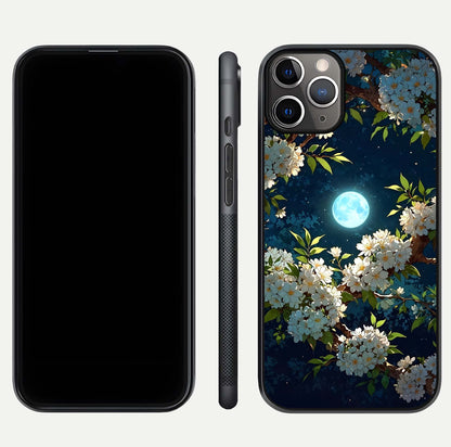 Moonlit Blossom Dream Glass Case for iPhone 11 Pro Max close-up angled shot showing glowing petals and reflection