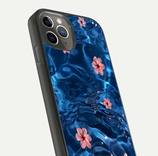 Blooming Water Drift Glass Case for iPhone 11 Pro Max side-angle image showcasing blossom flow, curved corners, and HD glass gloss