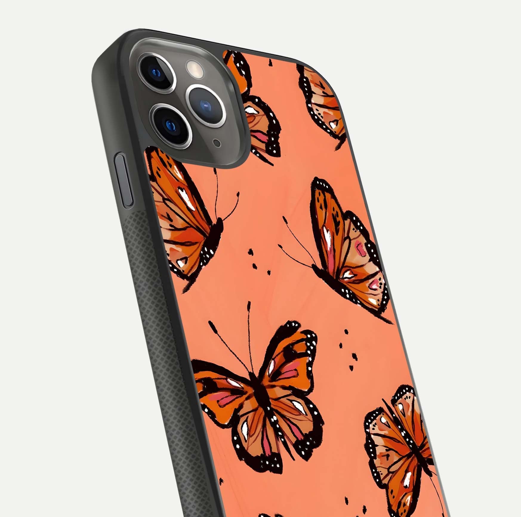 Coral Wing Butterfly Glass Case for iPhone 11 Pro Max side-angle photo showing reflective finish and smooth edges